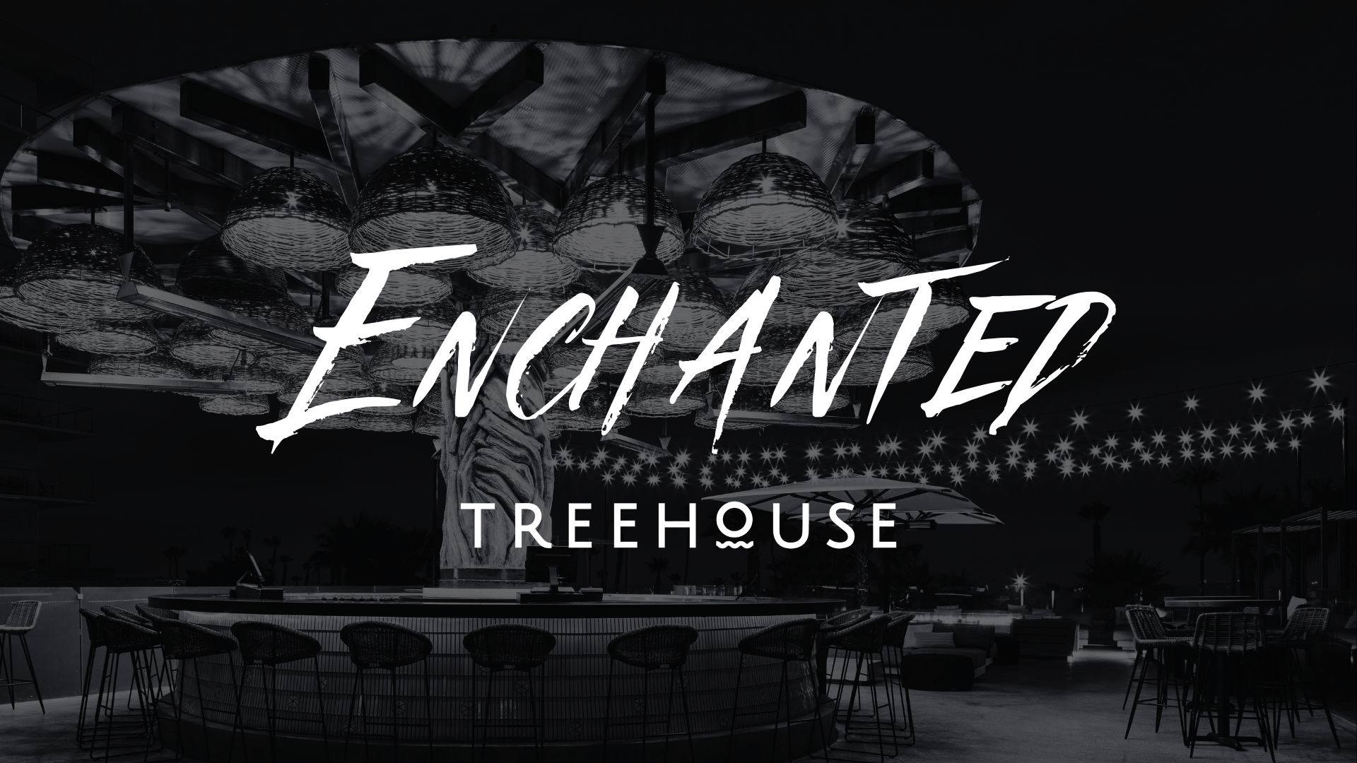 Outdoor bar area at night with hanging lights and wicker chairs, centered around a large, illuminated tree—an Enchanted Treehouse vibe with bold “Enchanted Treehouse” text overlay.